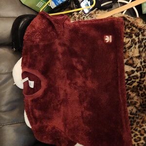 This is an Adidas sherpa fleece sweatshirt in a deep red or burgundy color. xl